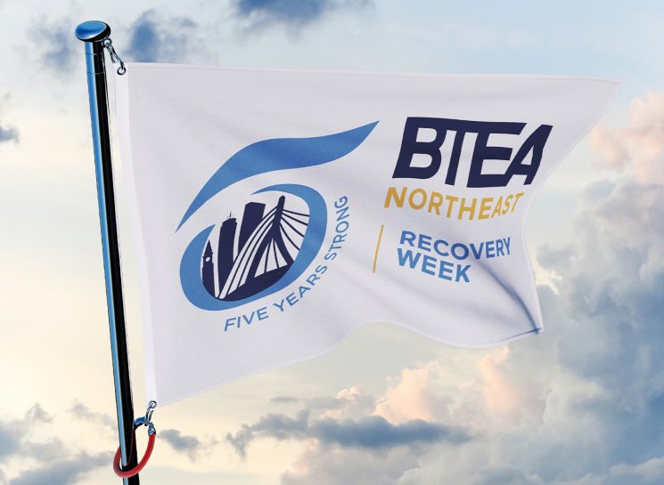 White flag with Recovery Week 5th anniversary logo